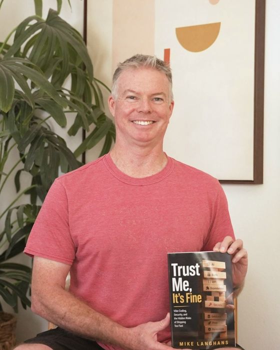 Mike Langhans holding Trust Me, It&rsquo;s Fine