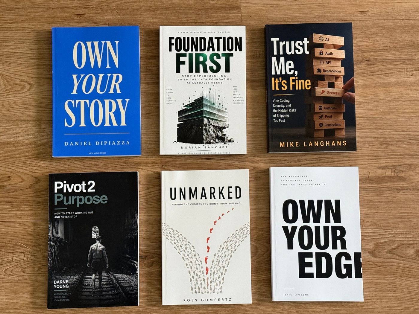 Six printed books made with Aldus Studio