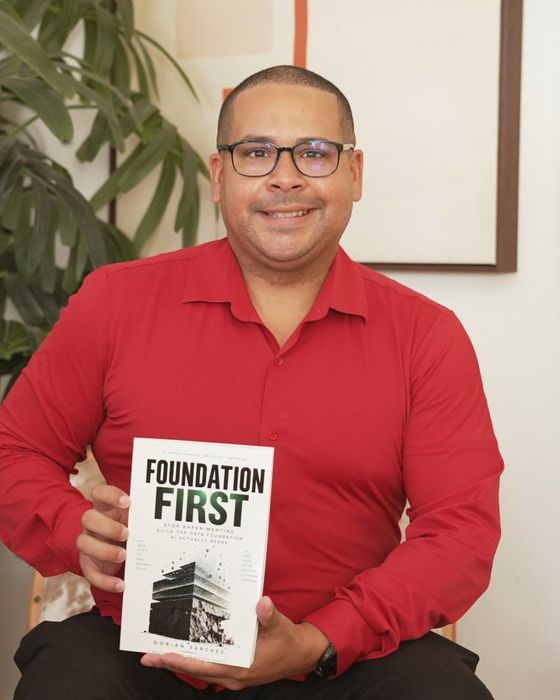 Dorian Sanchez holding Foundation First